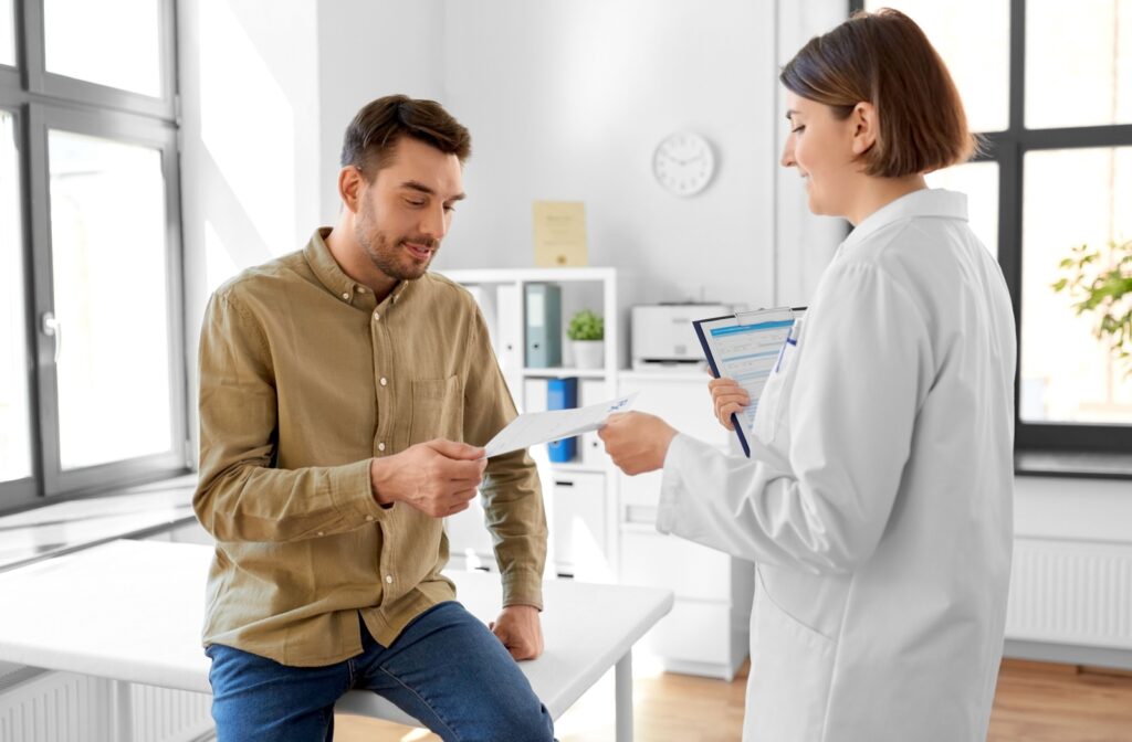 An optometrist shares their patient's referral document for a vision therapy consult.